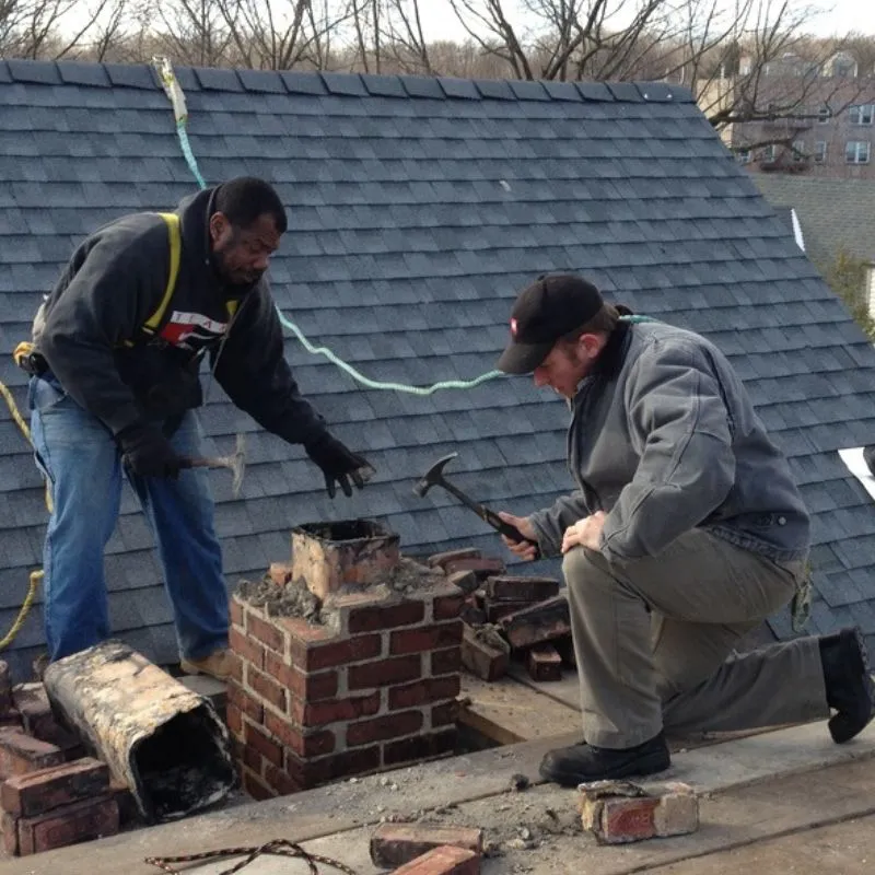 Michael Casolaro working on a chimney repair